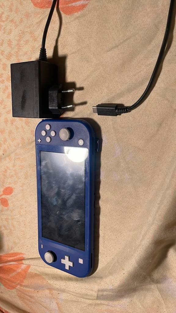 Switch Lite, Spelcomputers en Games, Spelcomputers | Nintendo Switch Lite, Zo goed als nieuw, Roze of Coral, Ophalen of Verzenden