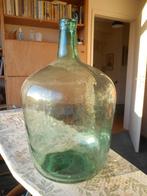 grote groene  fles, Ophalen