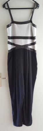 Zwart met wit jumpsuit, Maat 38/40 (M), Zwart, Ophalen of Verzenden, Zo goed als nieuw