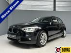 BMW 1-serie 118i High Executive Nwe Ketting|Cruise|Navi|Xeno, Auto's, BMW, 1-Serie, Zwart, 4 cilinders, Zwart