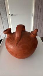 Terracotta Waterkoeler, Ophalen