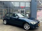BMW 1-serie 116i Upgrade Edition | Airco | Leer | Xenon| N.A, Auto's, BMW, Gebruikt, 4 cilinders, Blauw, 1200 kg