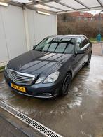 Mercedes-Benz E-Klasse 1.8 E200 CGI Sedan AUT 2010 Grijs, Auto's, Mercedes-Benz, Euro 5, Zwart, 4 cilinders, 1796 cc