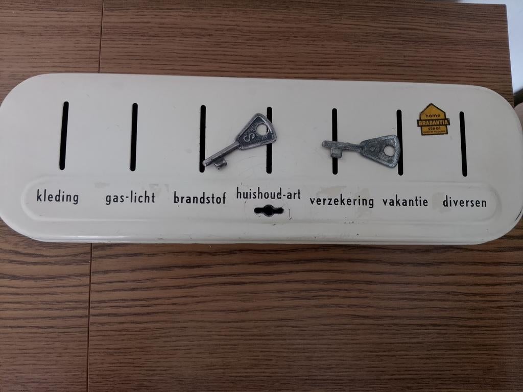 Antieke Brabantia spaarpot met sleutels, Verzamelen, Ophalen of Verzenden, Gebruikt, Metaal of Blik, Overige thema's