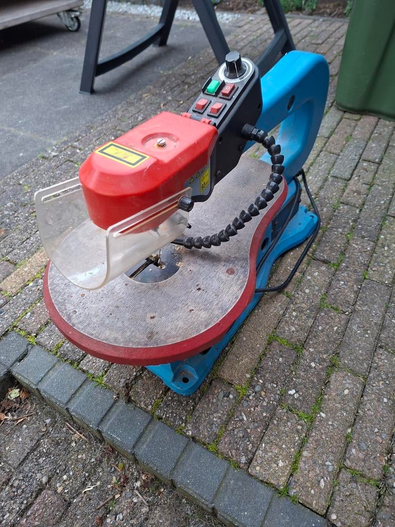 Decoupeerzaag tafelmodel, Ophalen
