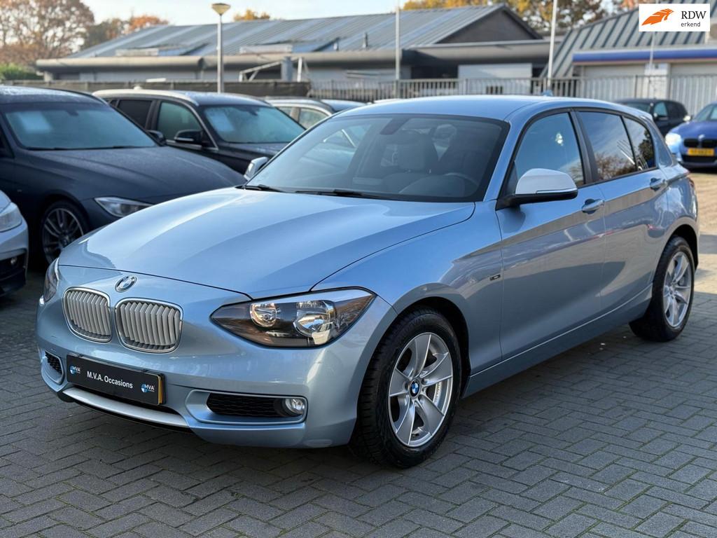 BMW 1-serie 116i Business+ Urban|Nieuwe Ketting + Klepseals|, Auto's, BMW, 1-Serie, Euro 5, Gebruikt, Zwart