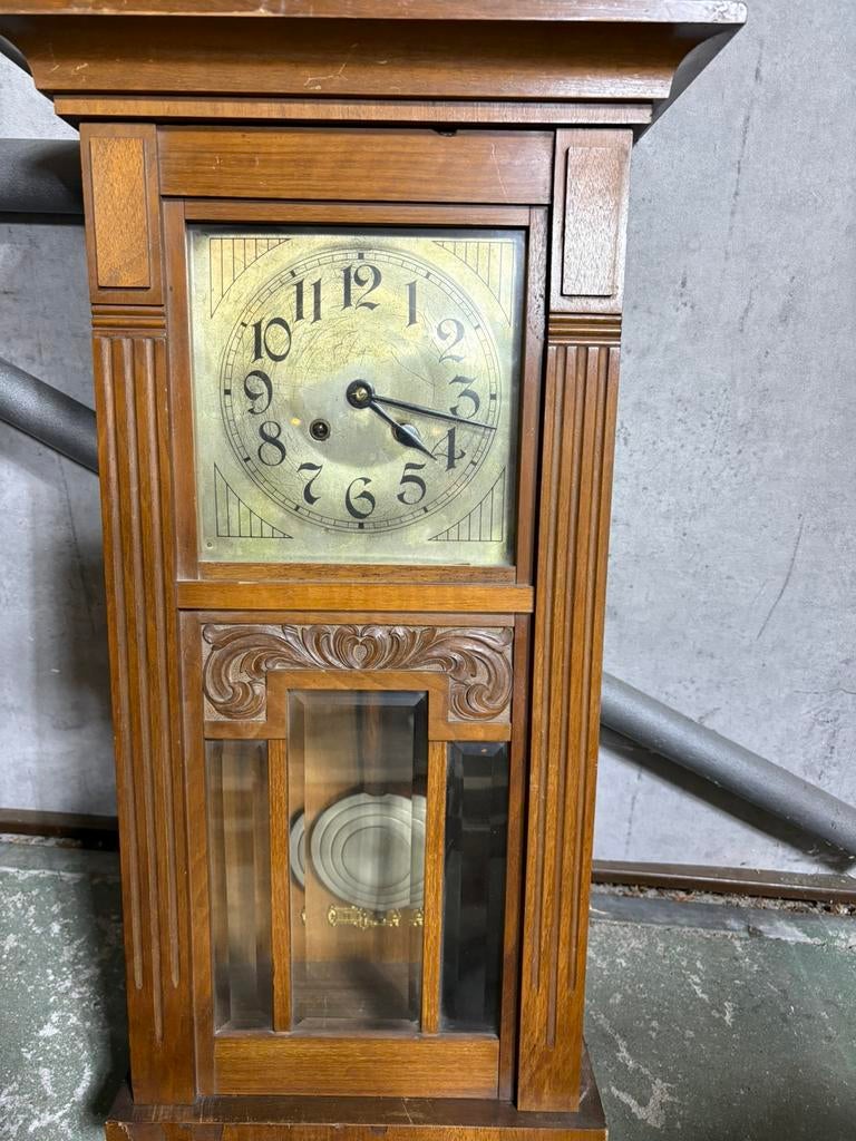 Klok lopend en met sleutel, Ophalen