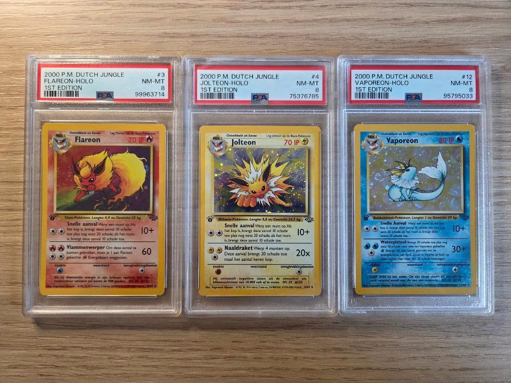 Flareon, Jolteon, Vaporeon 1st edition Holo - PSA 8, Ophalen of Verzenden, Zo goed als nieuw, Meerdere kaarten, Foil