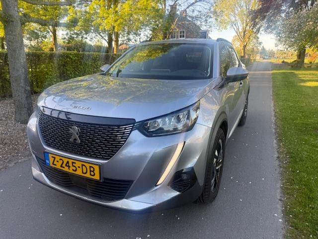 Peugeot 2008 1.2 PT Allure Pack (bj 2021, automaat), Auto's, Gebruikt, Euro 6, 1199 cc, 1180 kg