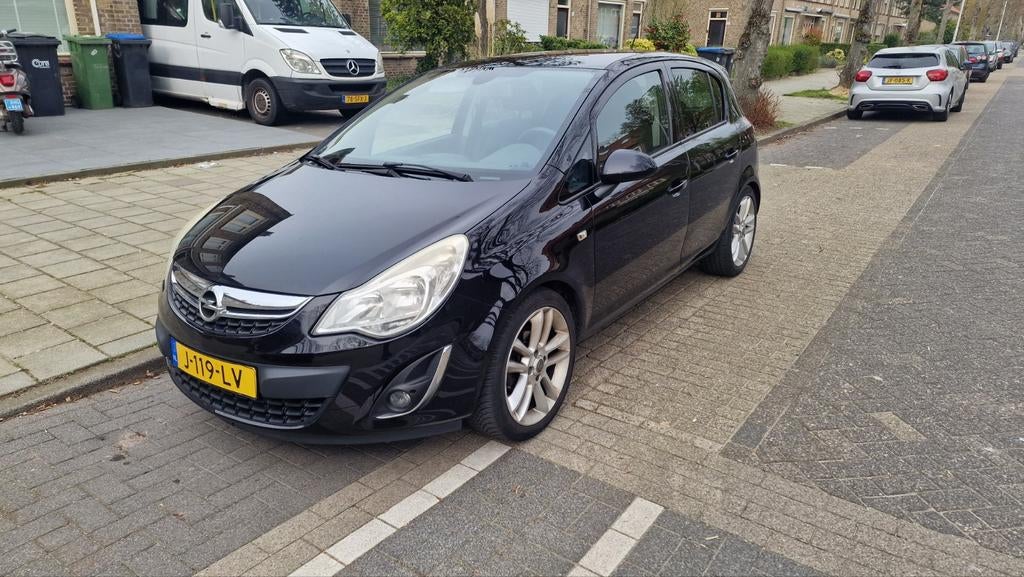 Opel Corsa 1.4 Ecotec 64KW 5D 2011 Zwart, Auto's, Voorwielaandrijving, 4 cilinders, Handgeschakeld, Particulier