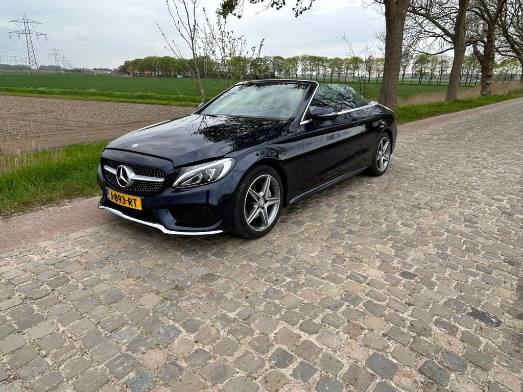 Mercedes-Benz C-Klasse C200 184pk 9G-TRONIC 2017 Blauw, Auto's, Achterwielaandrijving, 1800 kg, Zwart, 4 cilinders