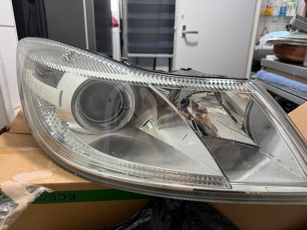 Koplamp Skoda Octavia (Hella 1Z1 941 016 F), Auto-onderdelen, Verlichting, Ophalen of Verzenden, Gebruikt, Skoda