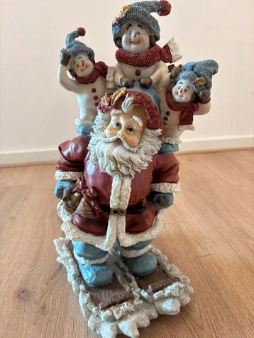 Kerstdecoratie beeldje van kerstman op ski’s beschikbaar voor biedingen