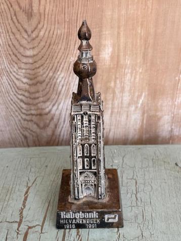 Beeldje Sint Petruskerk Hilvarenbeek. Rabobank 1991 zilver