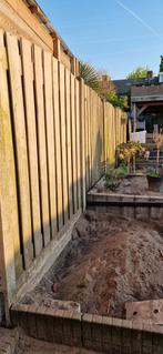 Schutting inclusief betonpalen en  onderplaten, Tuin en Terras, Schuttingen, Ophalen, Gebruikt, Hout, 6 meter of meer