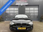 BMW 1-serie 116i High Executive Sport, Auto's, Gebruikt, 4 cilinders, Zwart, Leder