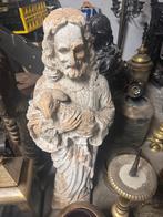 Het beeld toont Jezus die een lam of schaap vasthoudt,, Ophalen