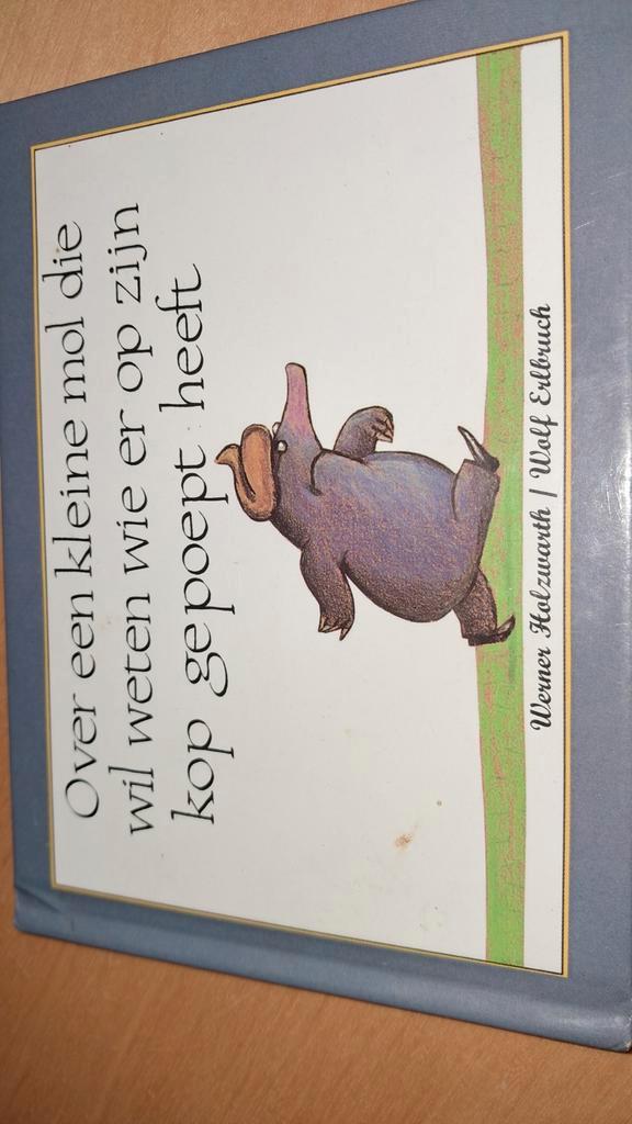 Over een kleine mol die wil weten wie er op zijn kop gepoept, Boeken, Prentenboeken en Plaatjesalbums, Zo goed als nieuw, Ophalen of Verzenden