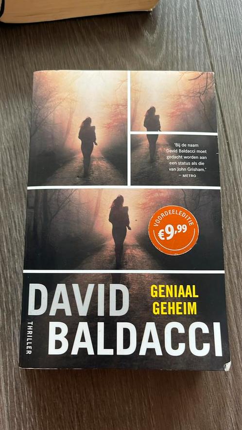 David Baldacci - Geniaal geheim, Boeken, Thrillers, Zo goed als nieuw, Nederland, Ophalen of Verzenden