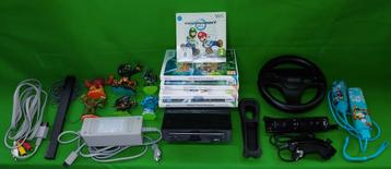 Nintendo Wii with 5 Games, 2 Controllers & More beschikbaar voor biedingen