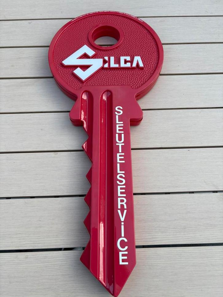 Grote kunstof Silca reclame sleutel, Verzamelen, Merken en Reclamevoorwerpen, Zo goed als nieuw, Reclamebord, Verzenden