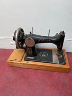 Naaimachine Köbler, Ophalen