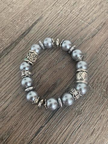 Partij 15 stuks elastische parel armbanden zilver A107 beschikbaar voor biedingen