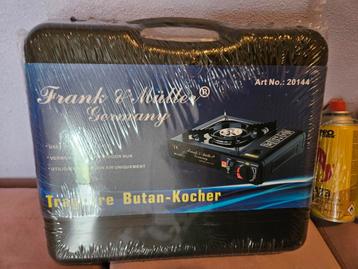 Nieuw draagbaar kooktoestel met 4x nieuw butangas beschikbaar voor biedingen