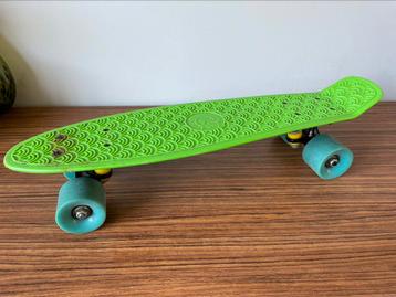 Groen pennyboard skateboard 