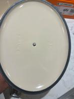 Nieuwe Le Creuset Ovale braadpan 25 cm Meringue in de doos, Gietijzer, Nieuw, Ophalen of Verzenden, Keramische plaat