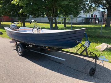 Boot + trailer + yamaha 9,9 pk prijs 1500,00 euro 