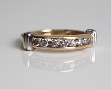 14 krt gouden rijring met 8 briljanten beschikbaar voor biedingen