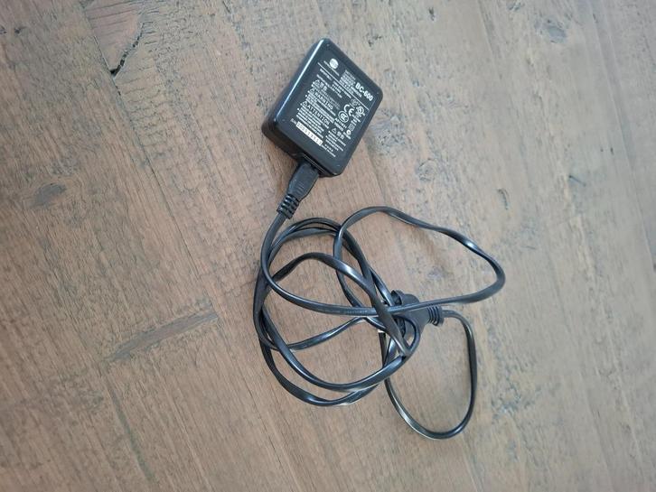 Konica Minolta oplader - BC-600, Audio, Tv en Foto, Fotografie | Accu's en Batterijen, Ophalen of Verzenden