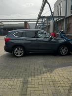 BMW X1 (f48) Sdrive20i 192pk Aut 2017 Grijs, Origineel Nederlands, Te koop, Zilver of Grijs, 5 stoelen