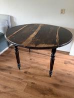 Houten eettafel met inklapbare zijkanten, Ophalen