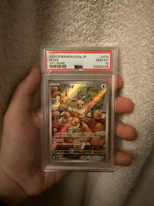 Psa 10 Eevee, Hobby en Vrije tijd, Verzamelkaartspellen | Pokémon, Nieuw, Verzenden