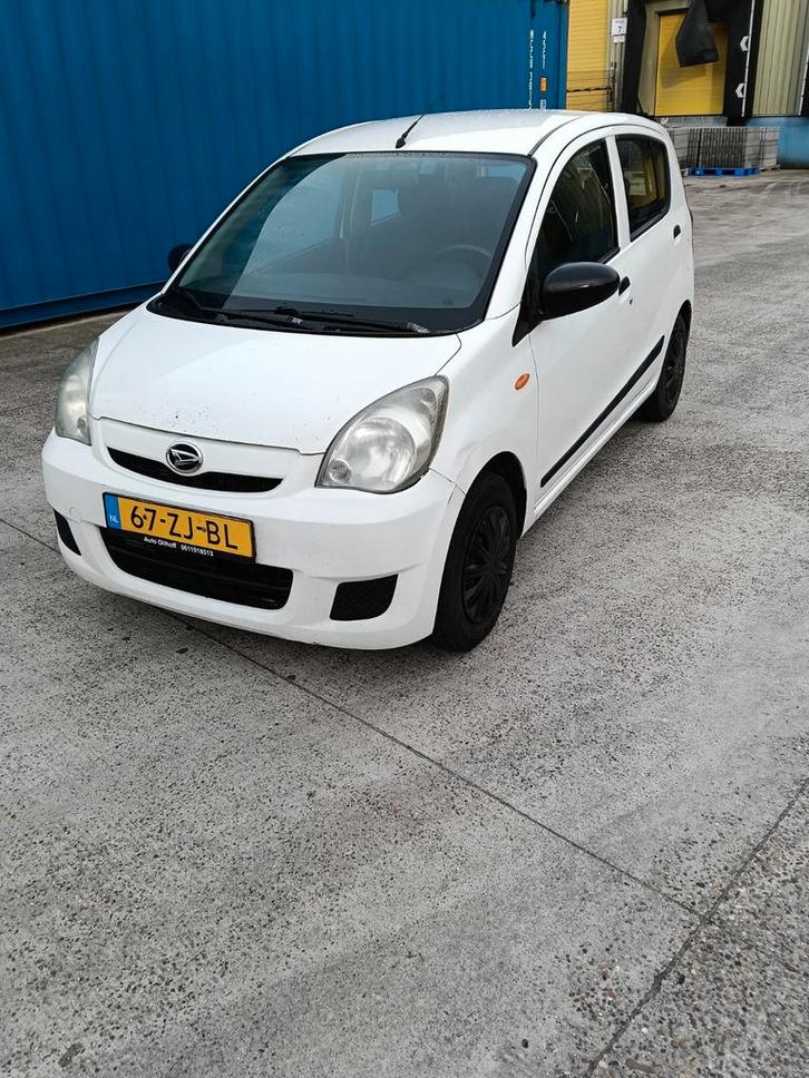 Daihatsu Cuore 1.0 5D 2008 Wit, Auto's, Daihatsu, Bedrijf, Cuore, ABS, Airbags, Centrale vergrendeling, Lichtsensor, Radio, Startonderbreker