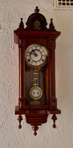 Paardjesklok wandklok, Ophalen