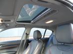 BMW 1-serie 116i Upgrade Edition AUTOMAAT | PANORAMDAK | CRU, Gebruikt, Zwart, 4 cilinders, Wit