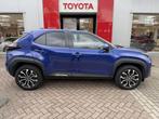 Toyota Yaris Cross 1.5 Hybrid First Edition, Stof, Gebruikt, Blauw, Bedrijf