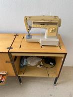 Singer naaimachine met naaitafel, Ophalen