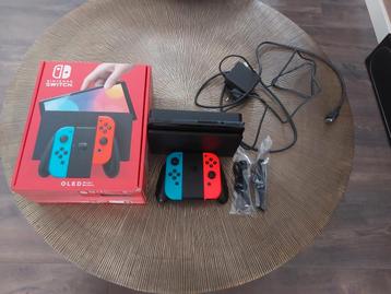 Nintendo switch oled blauw en rood als nieuw!! beschikbaar voor biedingen
