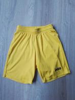 Izgst  fel geel voetbalbroekje, sportbroekje Jako mt 128, Jako, Jongen of Meisje, Sport- of Zwemkleding, Ophalen of Verzenden