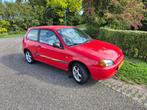Toyota Starlet 1.3 16V 1997 Rood, Auto's, Stof, 4 cilinders, Starlet, 400 kg