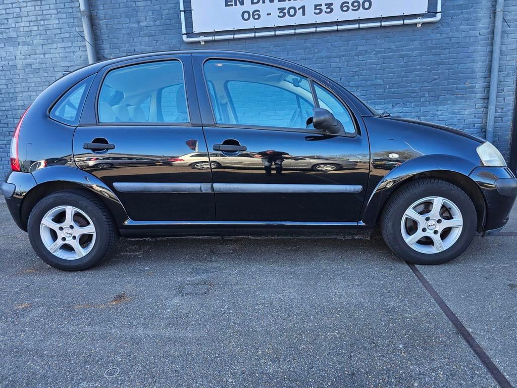 Citroen C3 1.4i Ligne Prestige, Voorwielaandrijving, Metallic lak, Zwart, Origineel Nederlands