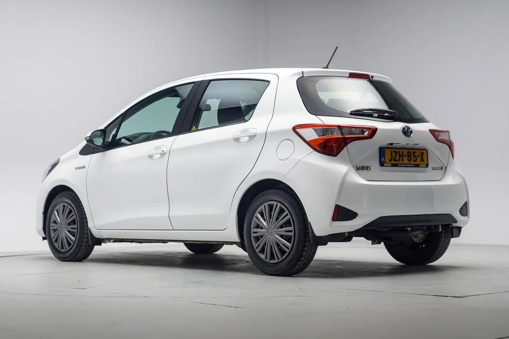 Toyota Yaris 1.5 Hybrid Business Aut [ Navi Camera Stoelverw, Auto's, Toyota, 1497 cc, Gebruikt, Wit, Bedrijf