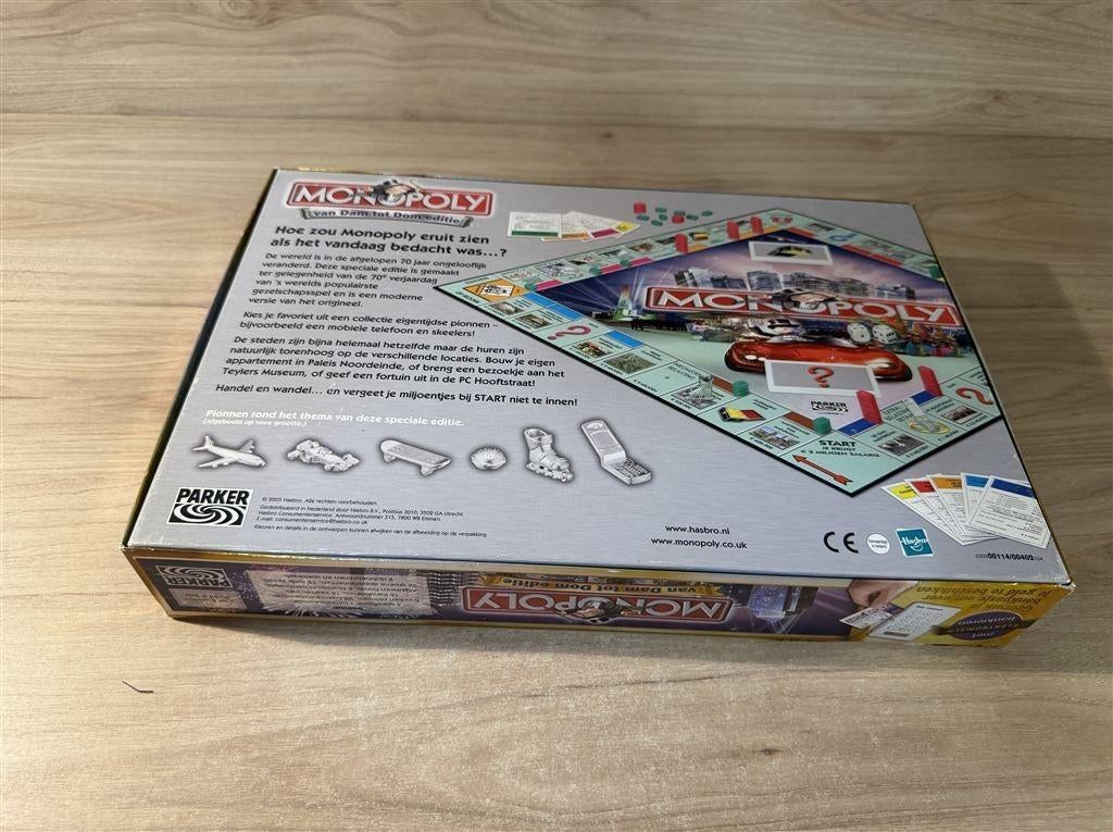 Monopoly van Dam tot Dom - s6129, Hobby en Vrije tijd, Gezelschapsspellen | Bordspellen, Verzenden, Zo goed als nieuw