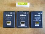 drie gebruikte Nikon lithium ion accu's EN-EL 12 met 1 kapje, Ophalen of Verzenden, Gebruikt