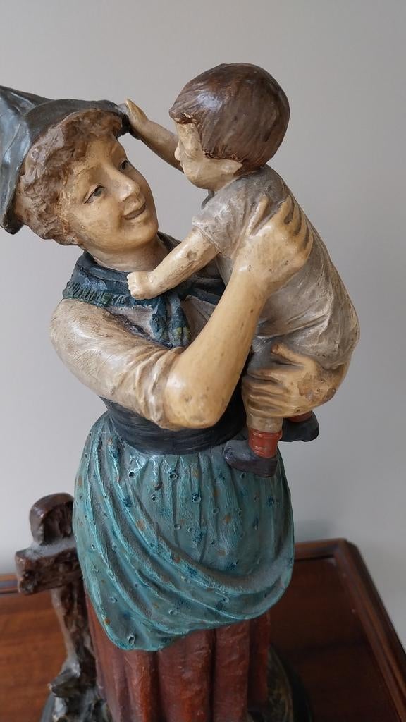 Beeld moeder en kind, Ophalen