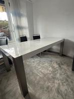 Witte eettafel met metalen poten, Ophalen